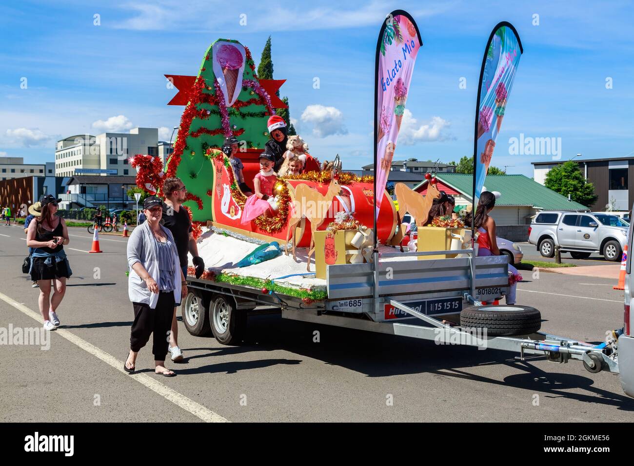 Enterprise Christmas Parade 2022 A Cat Cafe's Parade Float At A Christmas Parade In Rotorua, New Zealand.  The Seated Women Is Holding A Large Ginger Cat Stock Photo - Alamy