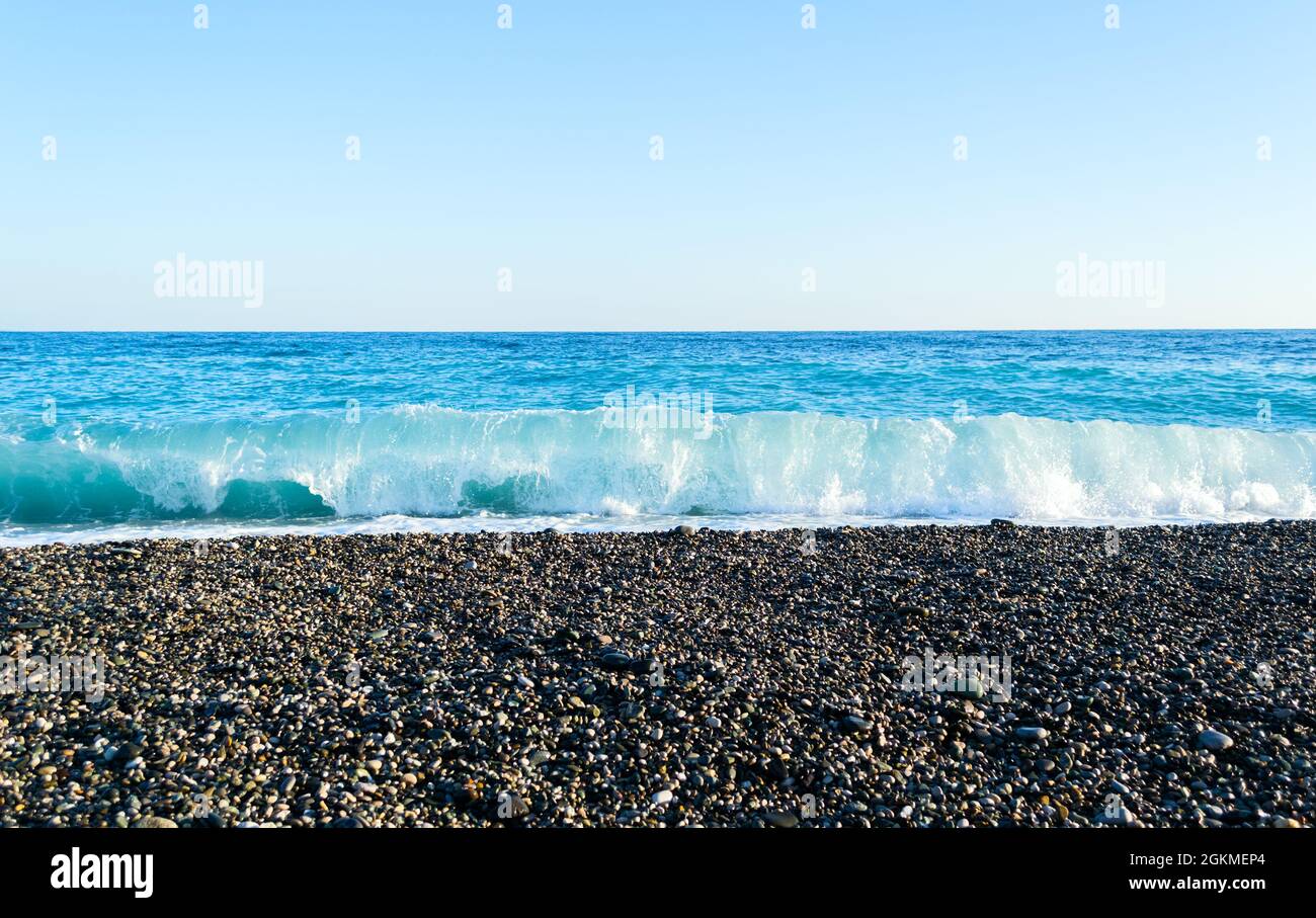 Stony beach sea waves sunset hi-res stock photography and images - Alamy