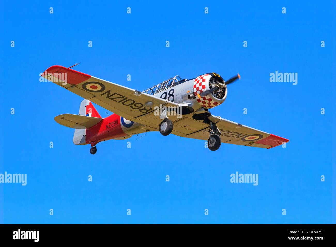 A North American Aviation T-6 Texan (aka Harvard), a WW2 training plane, flying at an airshow in New Zealand Stock Photo
