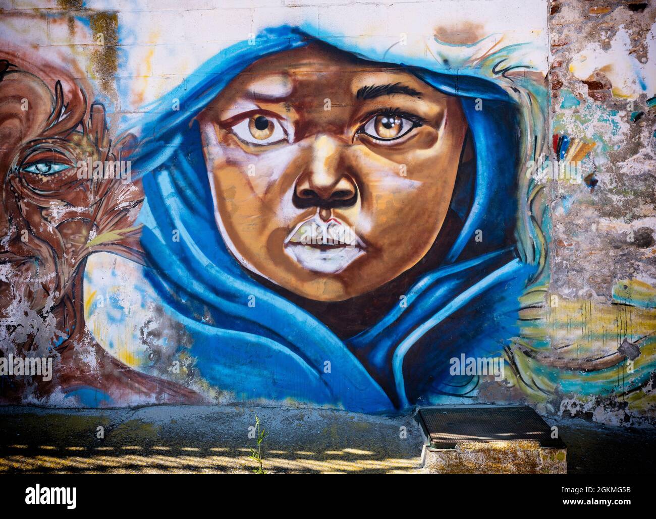 Wall art of a young black child in Nerja,  Malaga Province, Andalucia, Spain Stock Photo
