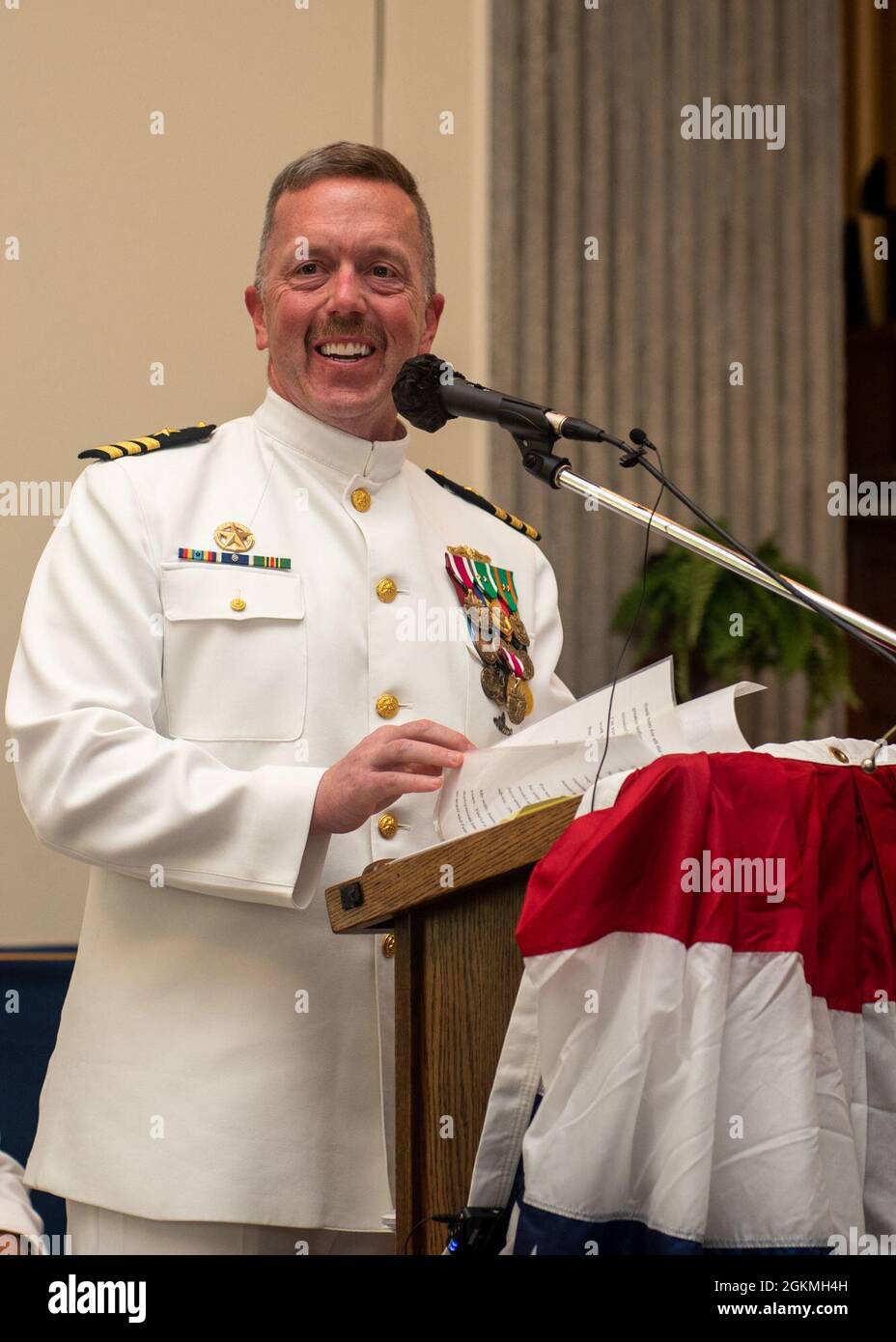KINGS BAY, Ga., (May 27, 2021)  Cmdr. Jason Anderson delivers remarks at the change of command ceremony for the Ohio-class ballistic-missile submarine USS Rhode Island (SSBN 740) (Gold). Cmdr. David Burke relieved Anderson as the commanding officer of Rhode Island Gold crew. Rhode Island is one of six ballistic-missile submarines stationed at the base and is capable of carrying up to 20 submarine-launched ballistic missiles with multiple warheads. Stock Photo