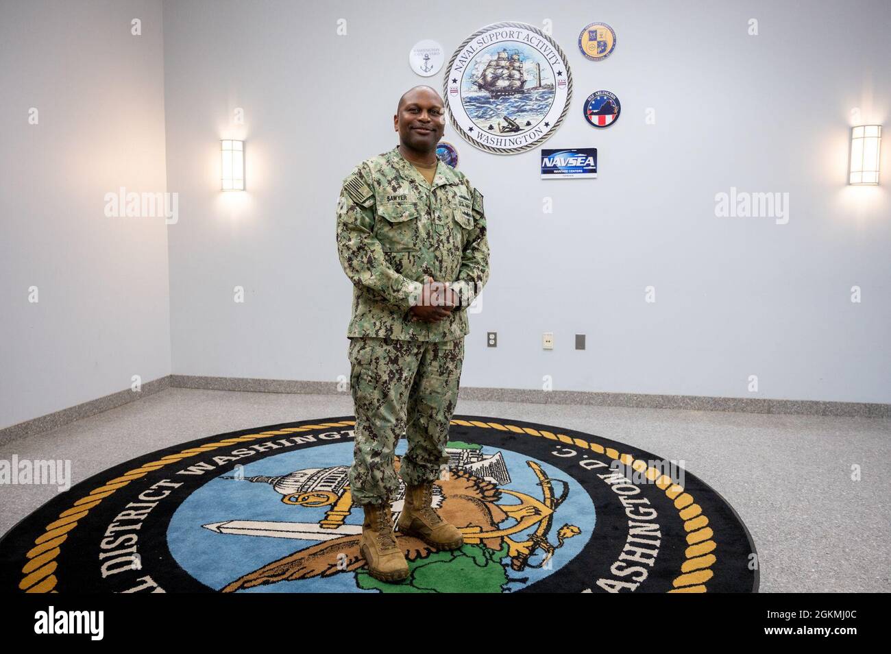 WASHINGTON, DC (May 27, 2021) – Chief Operations Specialist Marcus Sawyer poses onboard Washington Navy Yard, before an end-of-tour award ceremony held in his honor. Stock Photo
