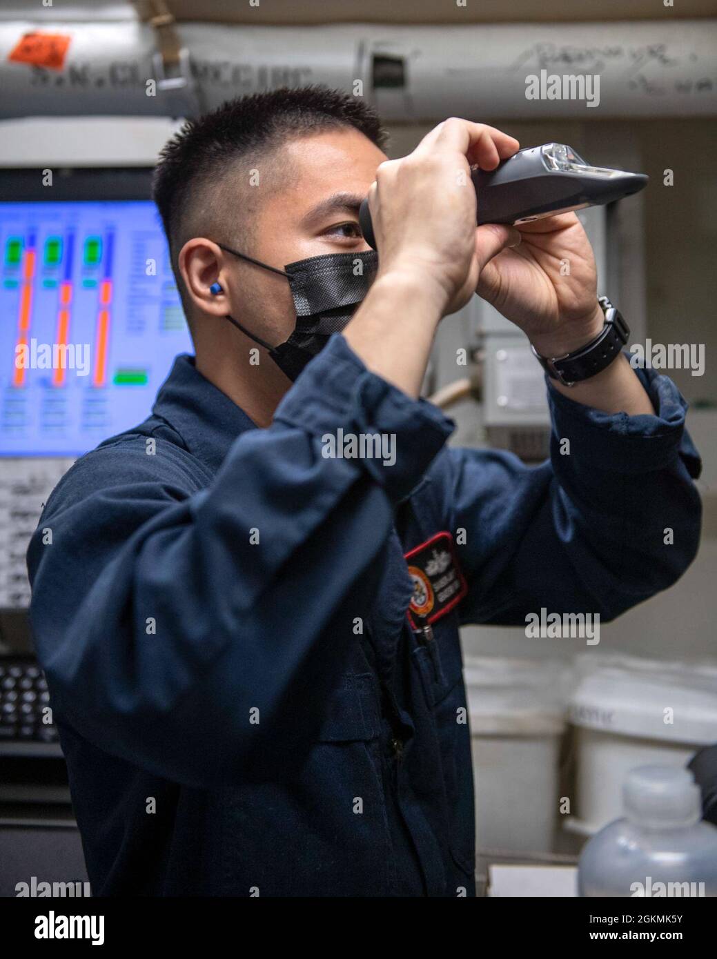 210527NHG8461022 YOKOSUKA, Japan (May 27, 2021) Sailor conducts a