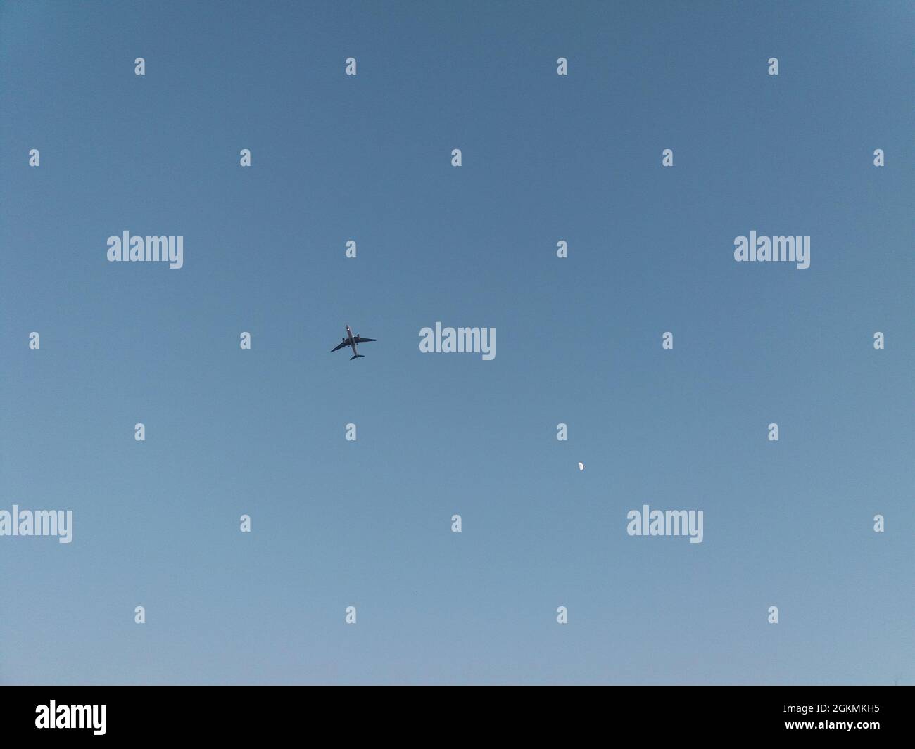 Stunning View Of Airplane And Crescent Moon Stock Photo - Alamy