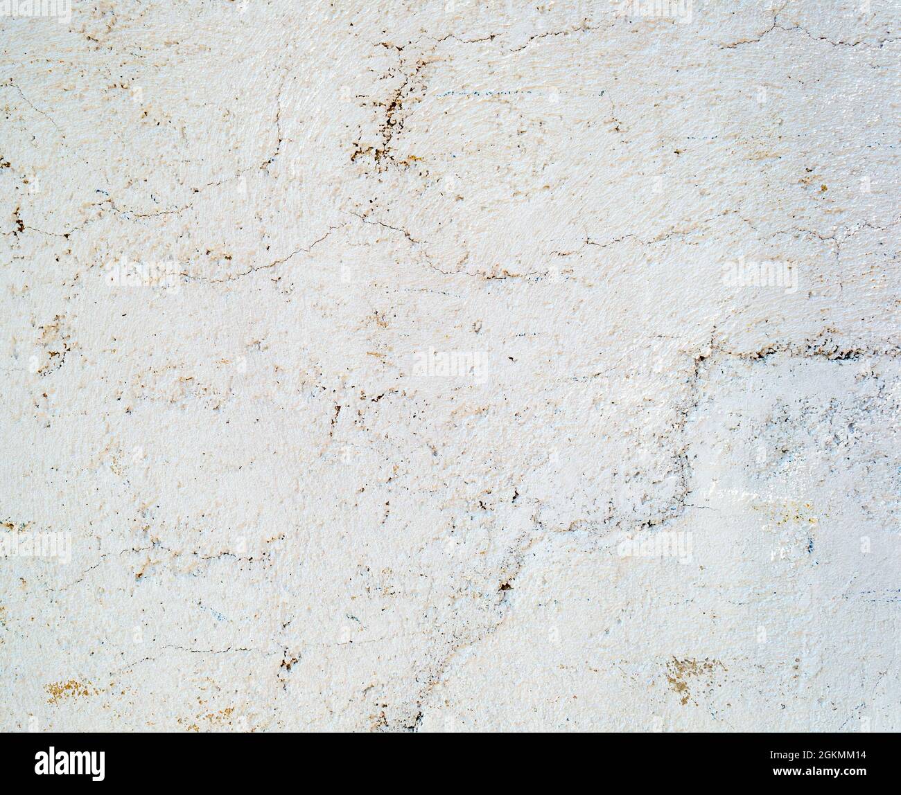 Cracked concrete painted wall background or texture. Close-up Stock Photo