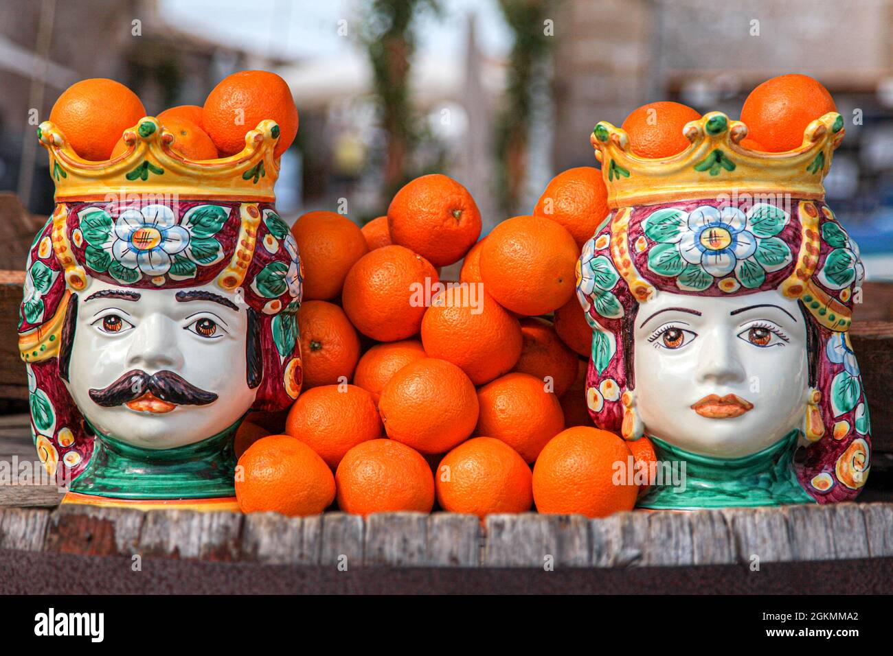 traditional Sicilian ceramic heads with oranges Stock Photo