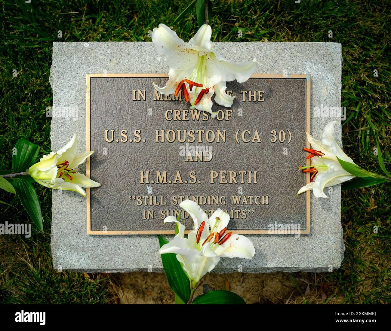 210528-N-CJ186-1152 ARLINGTON, Va. (May 28, 2021) -- The memorial site of USS Houston (CA 30) and HMAS Perth (D 38) resides in Arlington National Cemetery in dedication to those lost at sea. Houston and Perth currently remain at sea after their defeat in combat during World War II's Battle of Sunda Strait in 1942. Nearly three-quarters of Houston’s 1,093 crew perished at sea, and the survivors were captured as prisoners of war. NHHC is responsible for managing, researching, preserving, and interpreting the U.S. Navy's collection of sunken military craft, which includes more than 2,500 shipwrec Stock Photo