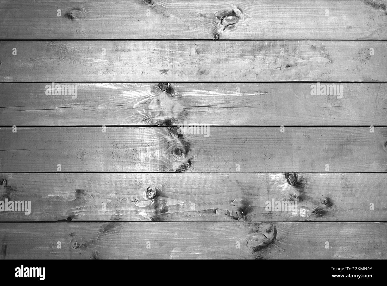 Grey wooden old plank texture as background. Closeup Stock Photo