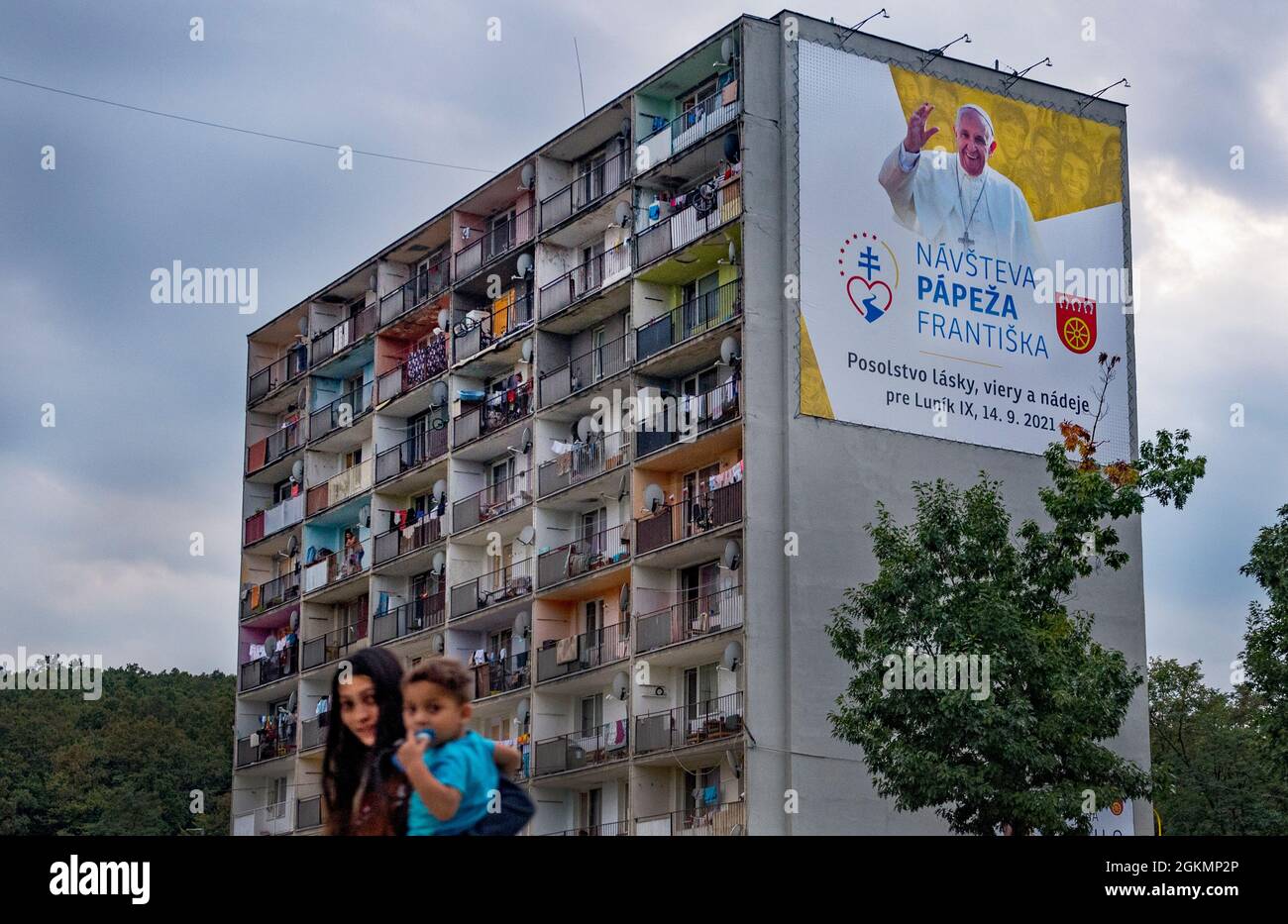 Kosice, Slovakia. 14th Sep, 2021. Billboard with pope Francis portrait at biggest Slovak Roma housing estate Lunik IX in Kosice before Pope Francis arrival to meet members of the Roma community, Slovakia, September 14, 2021, during his four-day visit to Slovakia, which started on Sunday. Credit: Roman Vondrous/CTK Photo/Alamy Live News Stock Photo