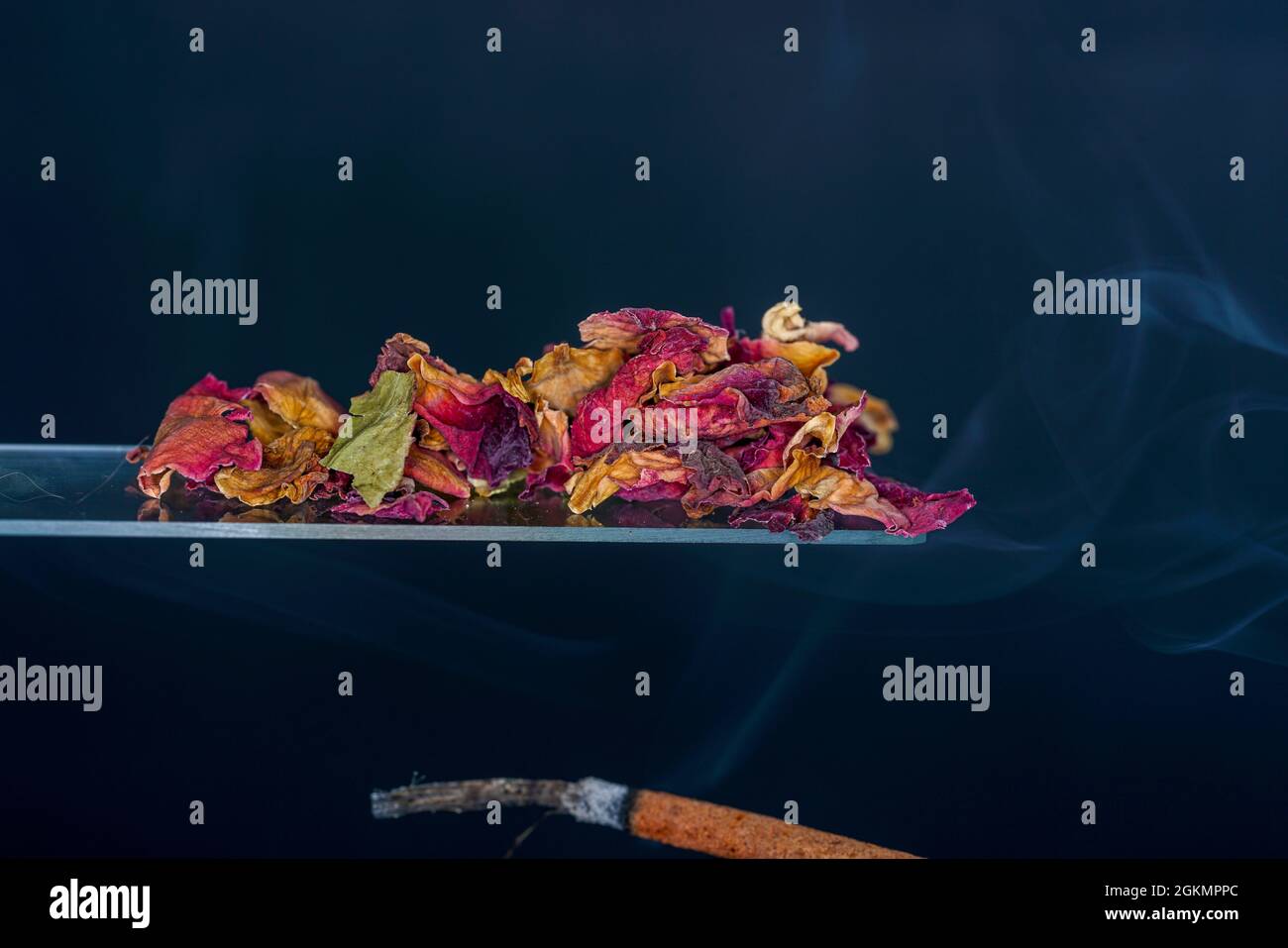 Spices for smoking in the studio photographed with smoke and dark
