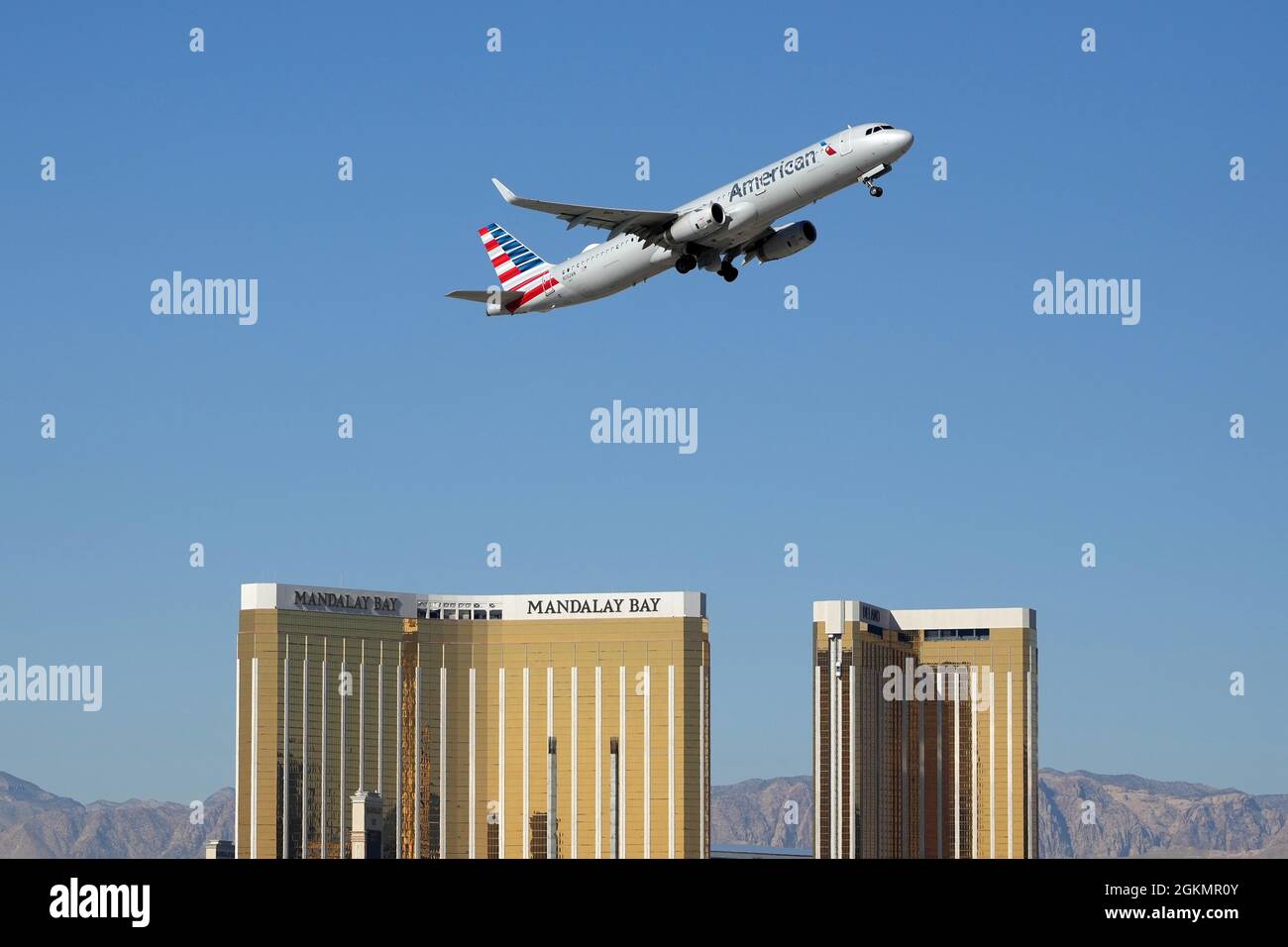 A general overall view of an American Airlines Airbus A321 (twin jet) registration N132AN takes off from the McCarran International Airport with the M Stock Photo