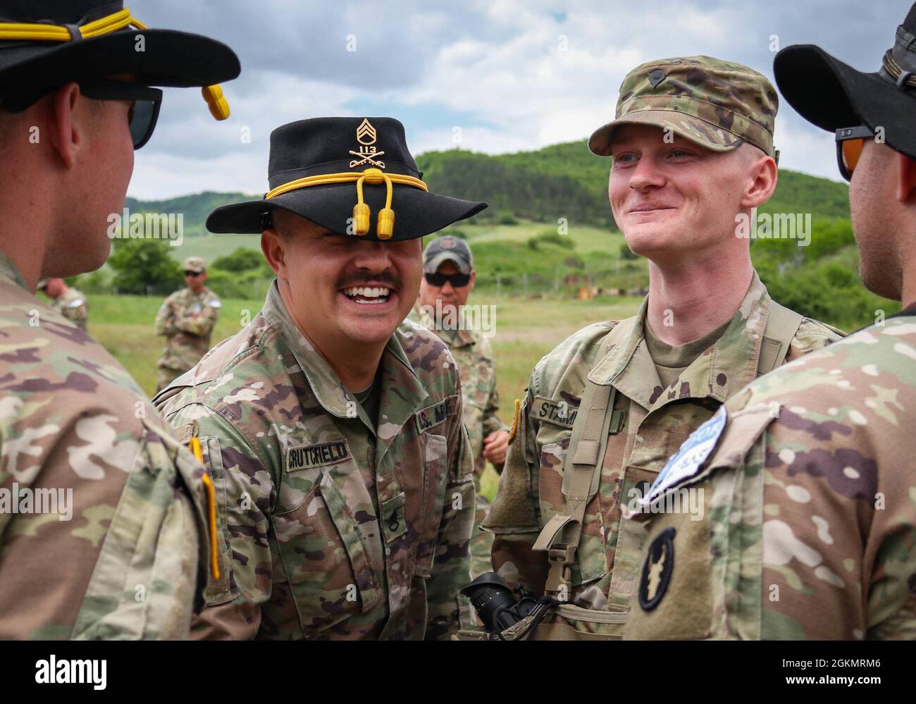 Iowa Army National Guard Soldiers break into smiles during a Spur Ride