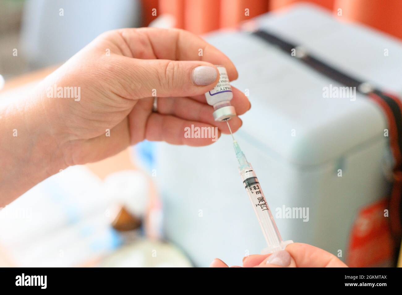 Kalush, Ukraine August 20, 2021: Pfizer coronavirus vaccine, Close-up of a vaccine vial, epidemic and ways to overcome, clinic. Stock Photo