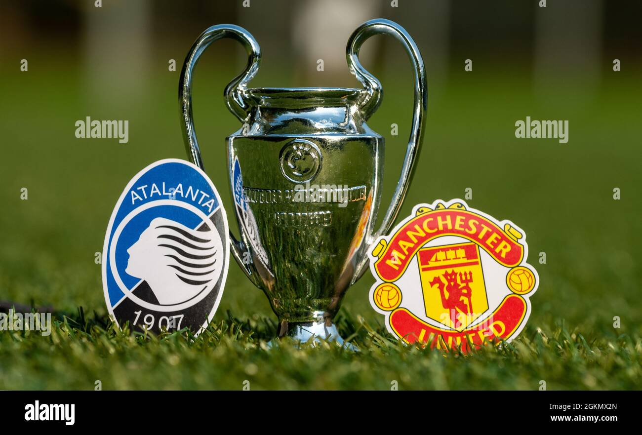 August 27 21 Bergamo Italy The Emblems Of Football Clubs Manchester United F C And Atalanta B C And The Uefa Champions League Cup On The Green Stock Photo Alamy