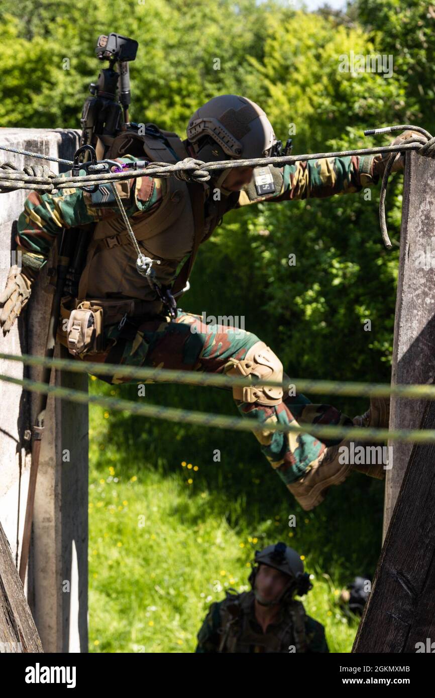 A Belgian Special Operations Forces sniper readies his rifle