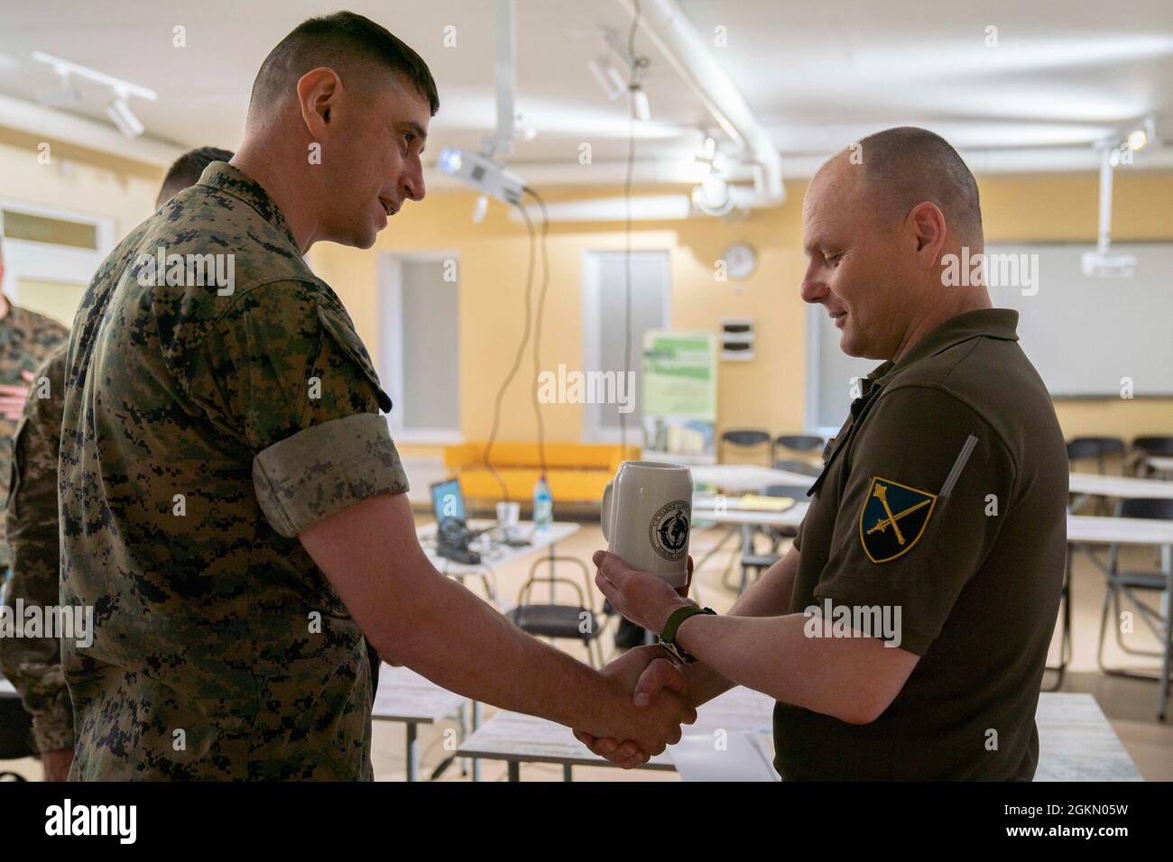 U.S. Marine Corps Maj. Brad Hull, left, Baltic and Black Sea desk