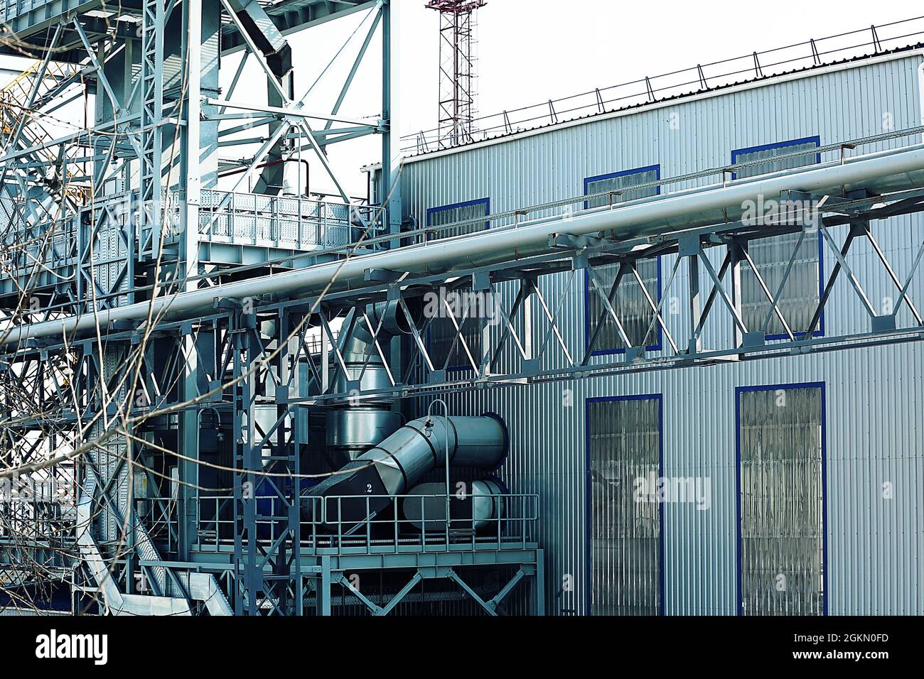 View of factory in sea port Stock Photo - Alamy