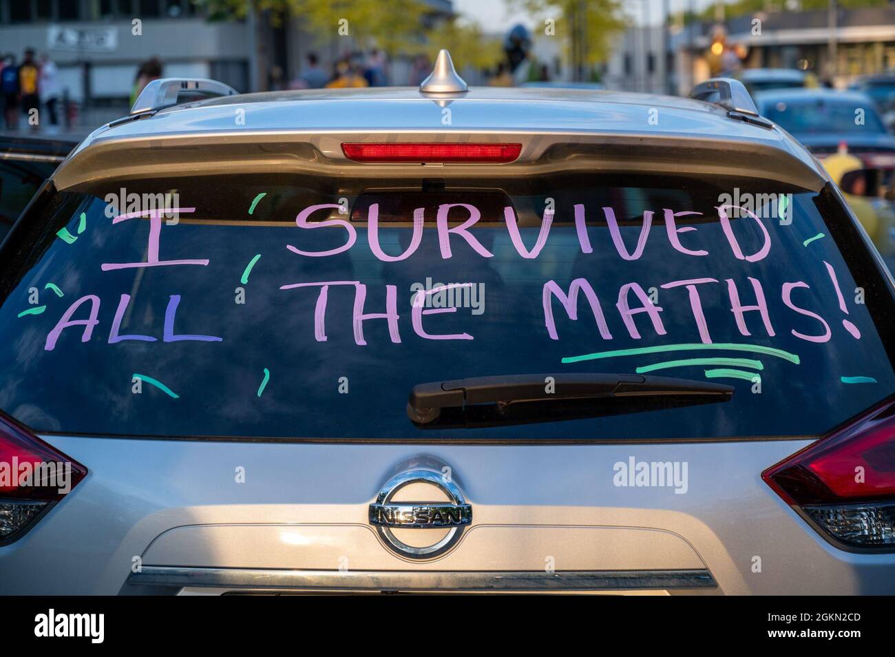 A car is humorously decorated during Stuttgart High School's outdoor, drive-in graduation ceremony at Panzer Barracks, Germany, June 2, 2021. Stock Photo