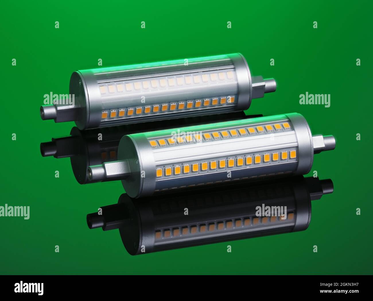 Linear R7S LED bulb, dimmable, on green background Stock Photo