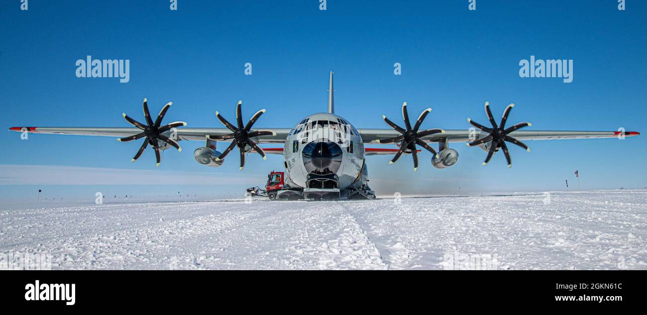 An LC-130 Skibird assigned to the 109th Airlift Wing sits on the ice runway at Raven Camp. Raven Camp is used to train members on landing on ice runways, polar airdrops and operating in the snow and ice conditions. Stock Photo