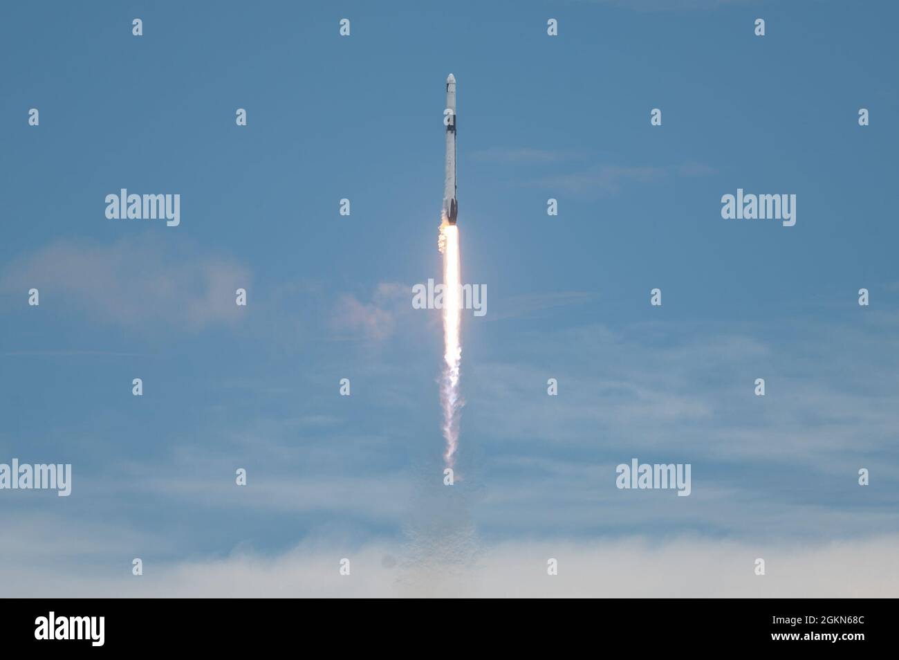 A SpaceX Falcon 9 rocket carrying NASA’s CRS-22 payload launches from launch complex 39A at Kennedy Space Center, Fla., June 3, 2021. The payload was the 22nd commercial resupply mission to the International Space Station and delivered supplies and science investigations, including studies on kidney disease treatments, cotton root systems, tardigrades' adaptation to space, and more. Stock Photo