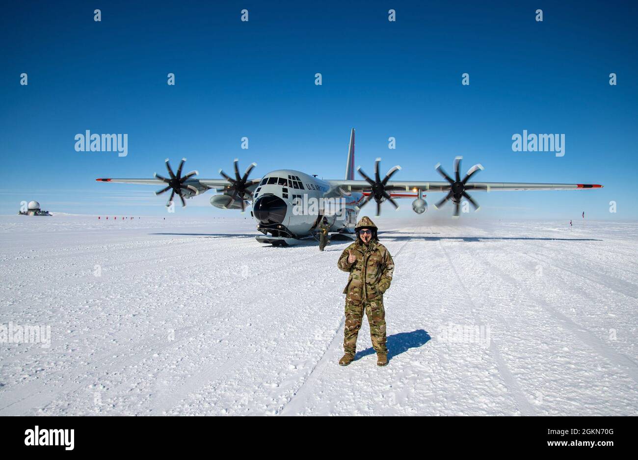 An Airmen assigned to the 109th Airlift Wing participates in a training mission at Raven Camp. Raven Camp is used to train members on landing on ice runways, polar airdrops and operating in the snow and ice conditions. The 109th operates in Greenland April-August each year to complete resupply missions for the National Science Foundation and polar operations training. Stock Photo