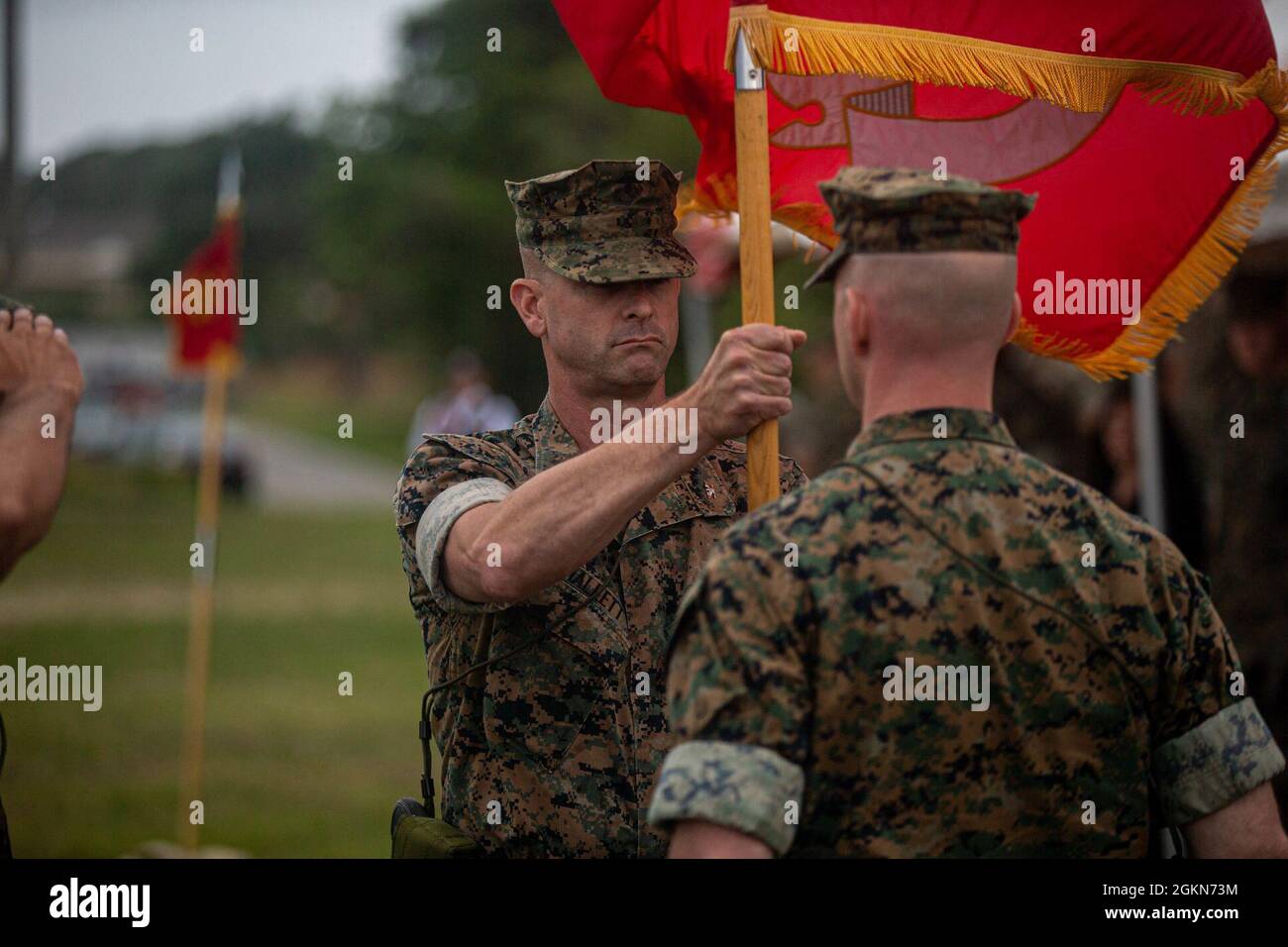 U.S. Marine Corps Col. Robert J. Hallett, left, outgoing commanding ...
