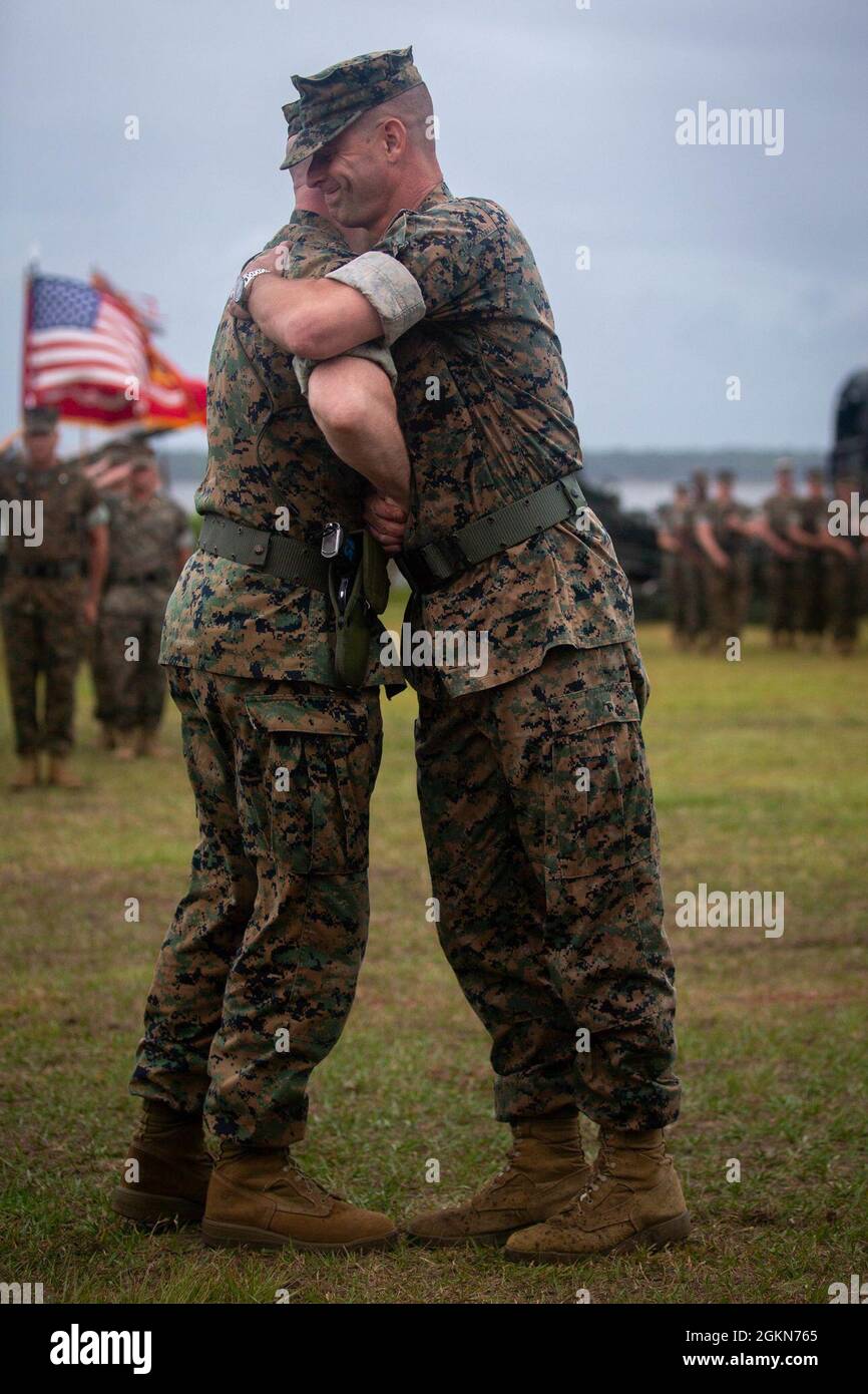 U.S. Marine Corps Col. Robert J. Hallett, left, outgoing commanding ...