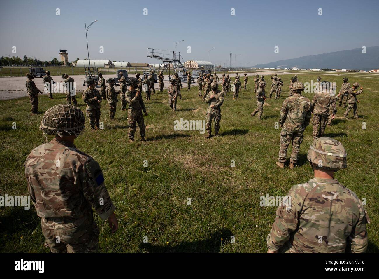 U.S. Army Soldiers assigned to U.S. Army Southern European Task Force, Africa, and the 2nd Battalion,503rd Infantry Regiment, 173rd Airborne Brigade, conduct sustained airborne training with their British counterparts at the Aviano Air Base in Aviano, Italy, June 3, 2021. African Lion 2021 is U.S. Africa Command's largest, premier, joint, annual exercise hosted by Morocco, Tunisia, and Senegal, 7-18 June. More than 7,00 participants from nine nations and NATO train together with a focus on enhancing readiness for U.S. and partner nation forces. AL21 is multi-domain, multi-component, and multin Stock Photo