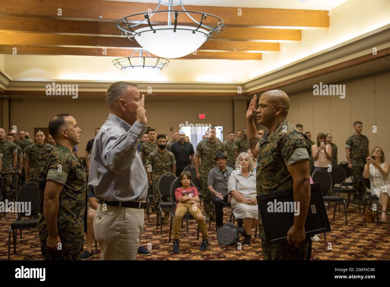 U.S. Marine Corps Master Sgt. James McFaline states the Oath of