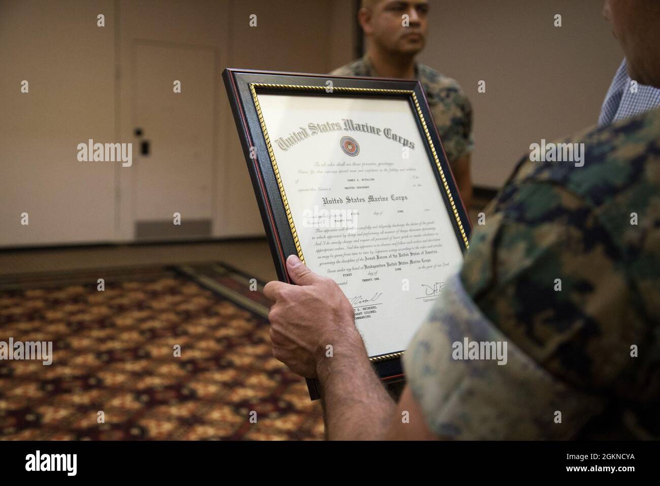 U.S. Marine Corps Master Sgt. James McFaline is read his promotion U.S. Marine Corps Master Sgt. James McFaline is read his promotion
