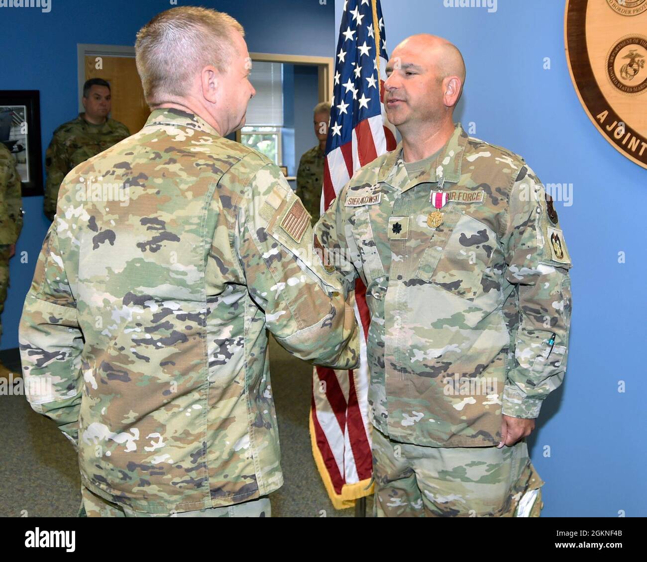 SELFRIDGE AIR NATIONAL GUARD BASE, Mich.— Lt. Col. Thomas Sierakowski, inspector general of the 127th Wing here,  receives the Meritorious Service Medal from Brig. Gen. Rolf E. Mammen, 127th Wing commander, here, on June 5, 2021. Stock Photo