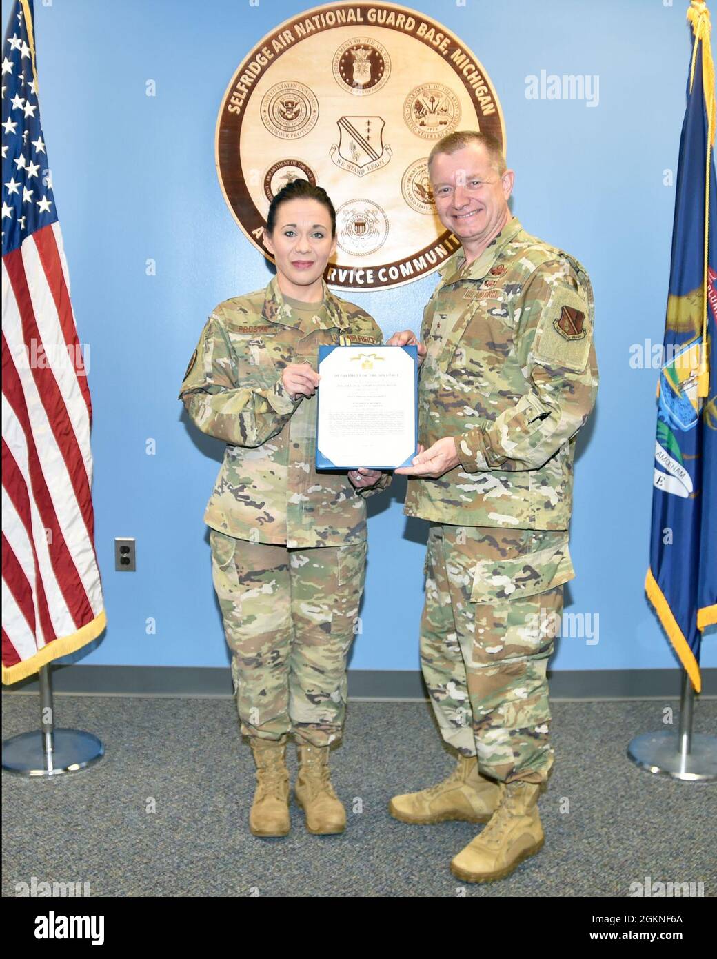 SELFRIDGE AIR NATIONAL GUARD BASE, Mich.— Master Sgt. Ninette Probyn, 127th Wing Command Post here,  is awarded the Air Force Commendation medal by Brig. Gen. Rolf E. Mammen, 127th Wing commander, here, on June 5, 2021. Stock Photo