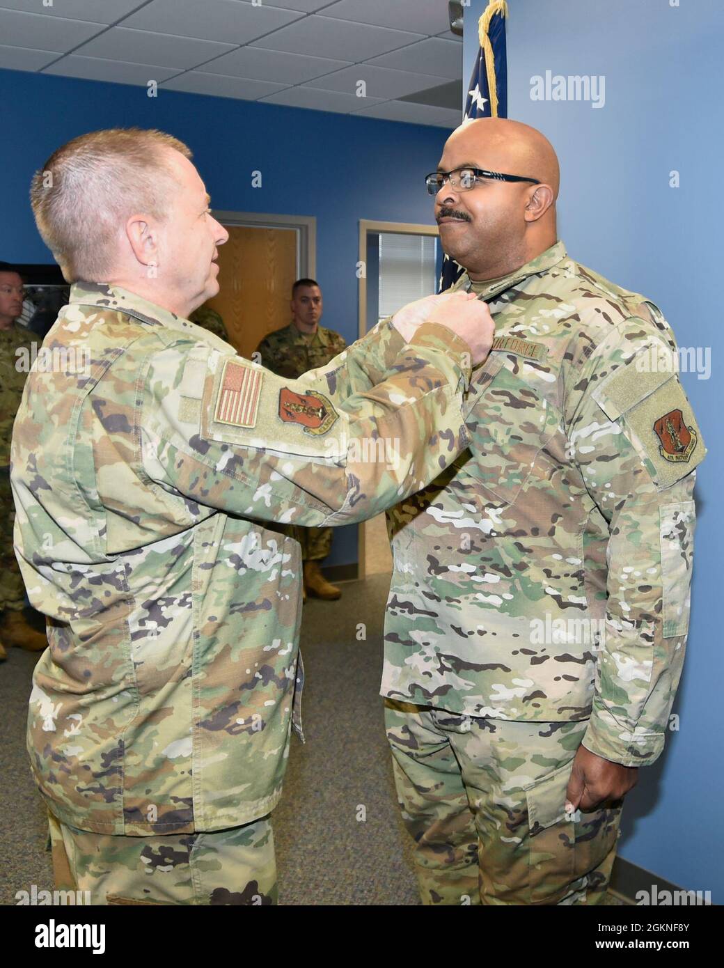 SELFRIDGE AIR NATIONAL GUARD BASE, Mich.— Sr. Master Sgt. Maurice Graves, 127th Wing human resource advisor here,  is awarded the Meritorious Service Medal by Brig. Gen. Rolf E. Mammen, 127th Wing commander here, on June 5, 2021. Stock Photo