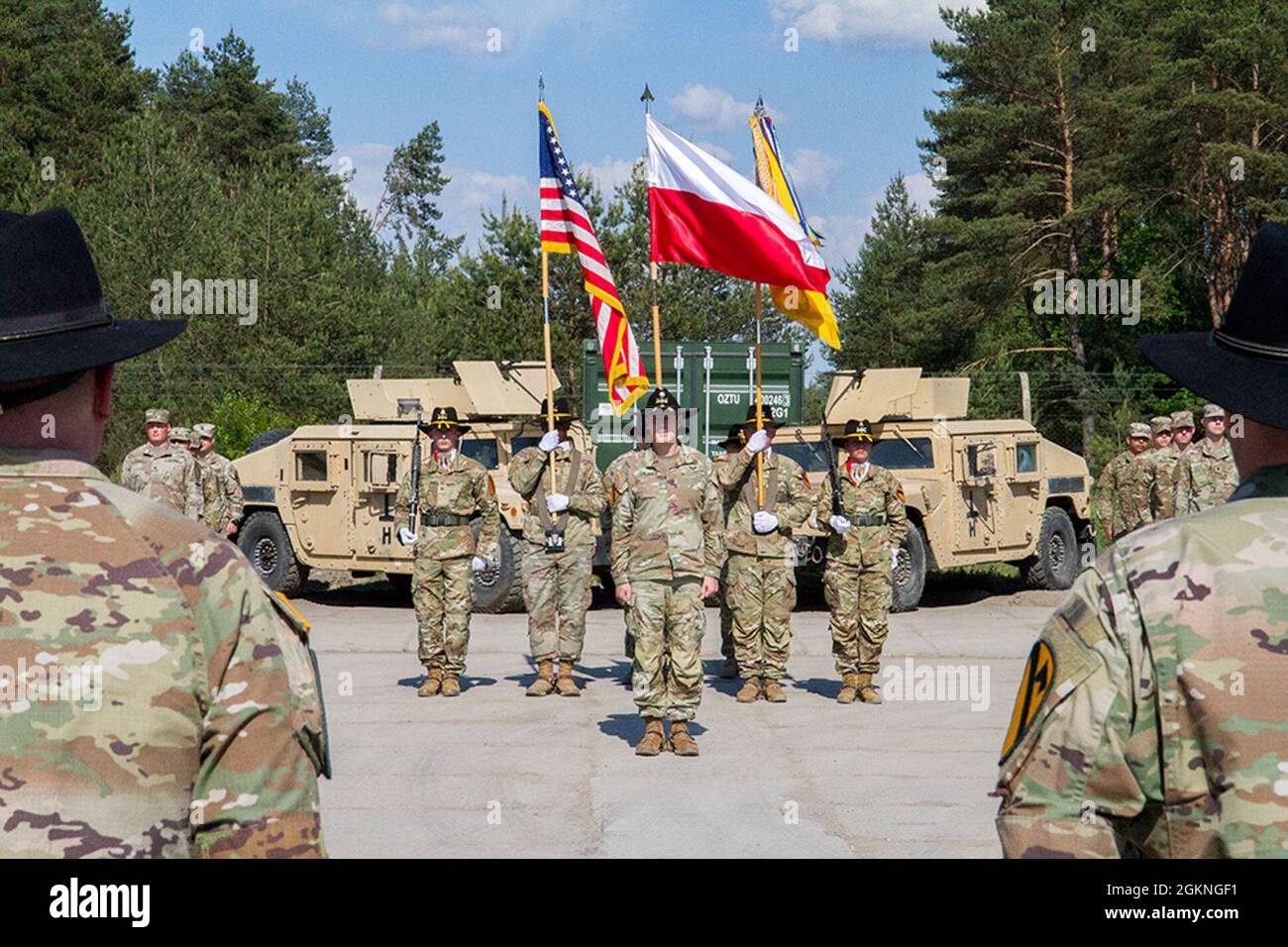 Army Lt. Col. Brennan Speakes (center) takes his place in formation as the new commander for 1st Squadron, 7th Cavalry Regiment “Garryowen,” at the end of a change of command ceremony at Forward Operating Site Drawsko Pomorskie Training Area, Poland, on June 5, 2021. Stock Photo