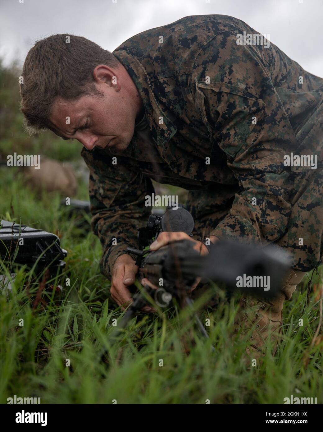 A Marine with 3rd Force Reconnaissance Company, 4th Marine Division, assembles his rifle during sniper training at Camp Shelby, Mississippi, on June 6, 2021. The Marines trained with the M107 semi-automatic long-range sniper rifle, an anti-materiel rifle that fires .50 caliber ammunition out to a maximum effective range of 2000 meters. Stock Photo
