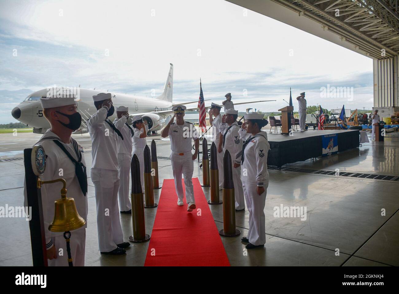 210607-N-SR472-0006 KADENA AIR BASE, Japan (June 7, 2021)  Commander Charles A. Larwood III departs the Change of Command Ceremony after being properly relieved as the Commanding Officer, Patrol Squadron (VP) FOUR FIVE June 7. CDR Larwood was relieved by CDR Eisenmenger as the Commanding Officer of VP-45. Stock Photo