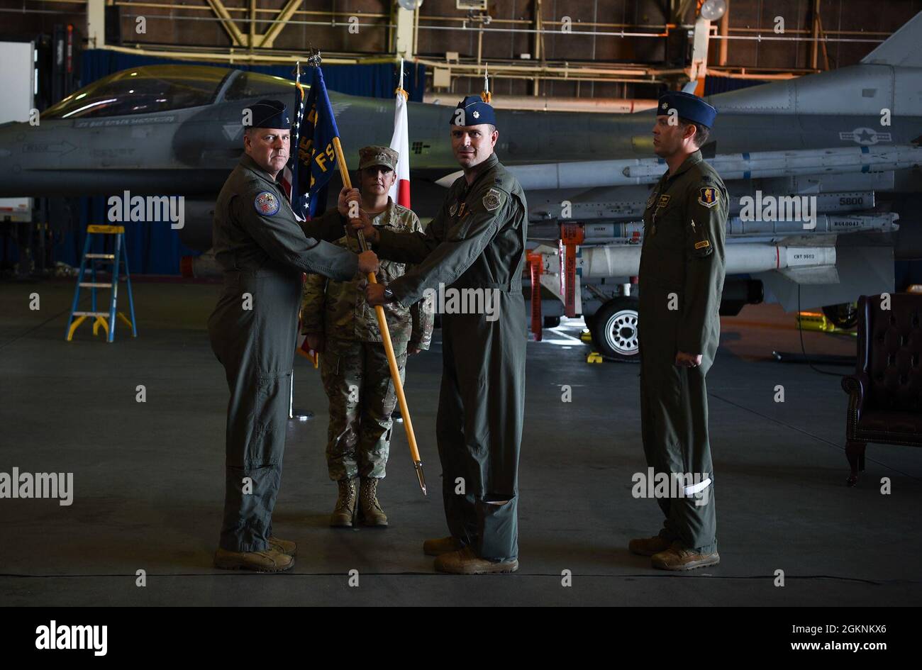 U.S. Air Force Lt. Col. David M. Dubel, incoming 14th Fighter Squadron commander, middle, takes command of the 14th FS during a change of command ceremony at Misawa Air Base, Japan, June 7, 2021. Dubel previously served as the 35th Fighter Wing Inspector General, and the Director of Operations for the 14th FS. Stock Photo