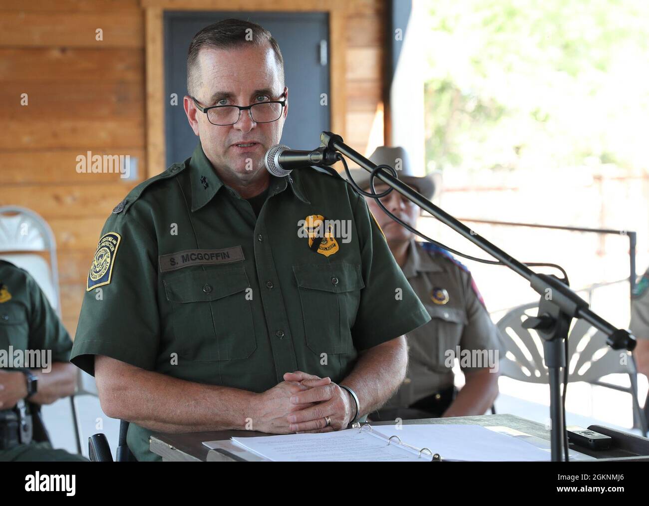 Big Bend Sector Chief Sean McGoffin speaks to ranchers and concerned citizens from the region during a community meeting at Ft. Davis, Texas, June 7, 2021. McGoffin was joined by multiple Border Agents in Charge of stations from Van Horn, Sierra Blanca, Alpine and Marfa along with the senior Texas Department of Public Safety officer for the region, the senior ranking Texas Game Warden, local sheriff's and judges. Stock Photo