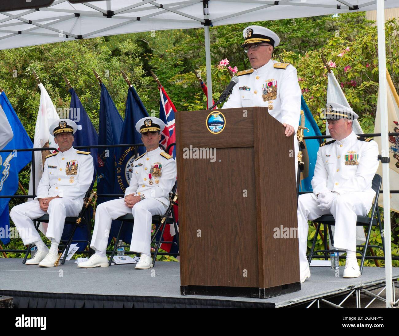 SILVERDALE, Wash. - Rear Adm. Robert Gaucher, commander, Submarine Group 9, delivers his remarks during the change of command ceremony held at Deterrent Park, Naval Base Kitsap-Bangor, June 8. Subordinate to Commander, Submarine Force, U.S. Pacific Fleet, COMSUBGRU- 9 exercises administrative, tactical and operational command and control authority for assigned Trident fleet ballistic and cruise missile submarines and subordinate commands and units in the Pacific Northwest. Subordinate commands include Submarine Squadrons 17 and 19, and Naval Submarine Support Center, Bangor. Stock Photo