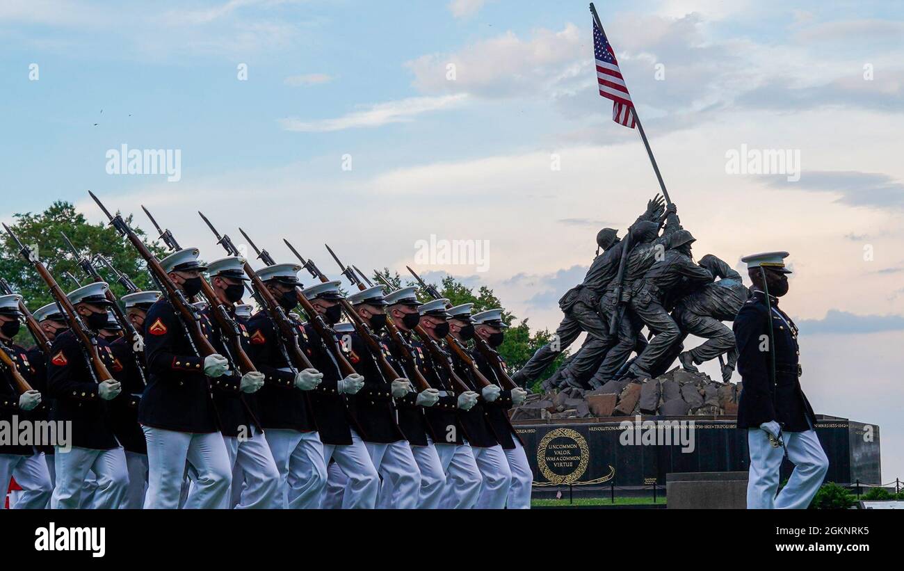 Marines with the Silent Drill Platoon march for “Pass in Review” during ...