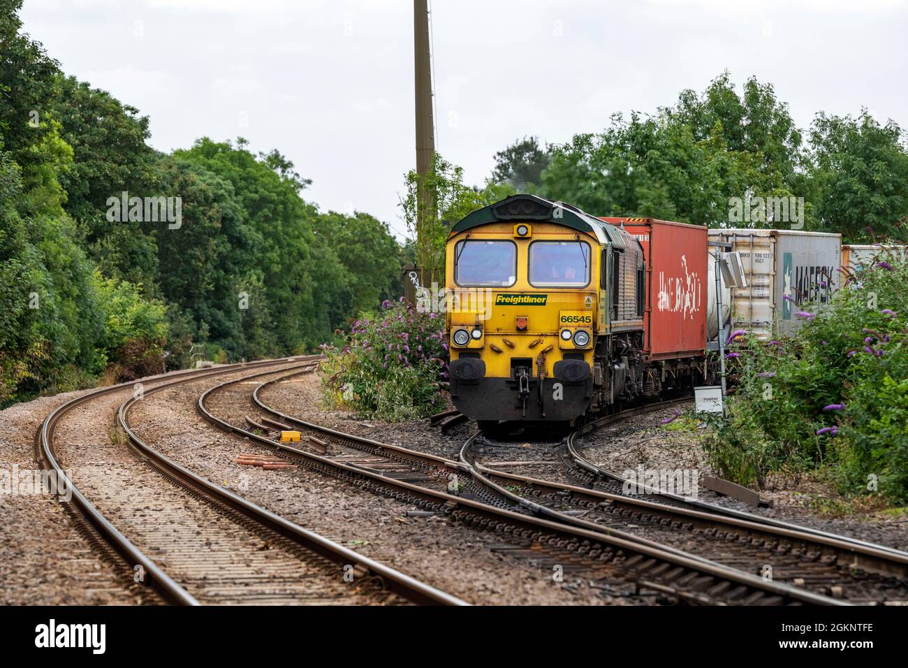 Freightliner cargo train from the port of Felixstowe entering the East Suffolk branch line at Westerfield, Suffolk. Stock Photo