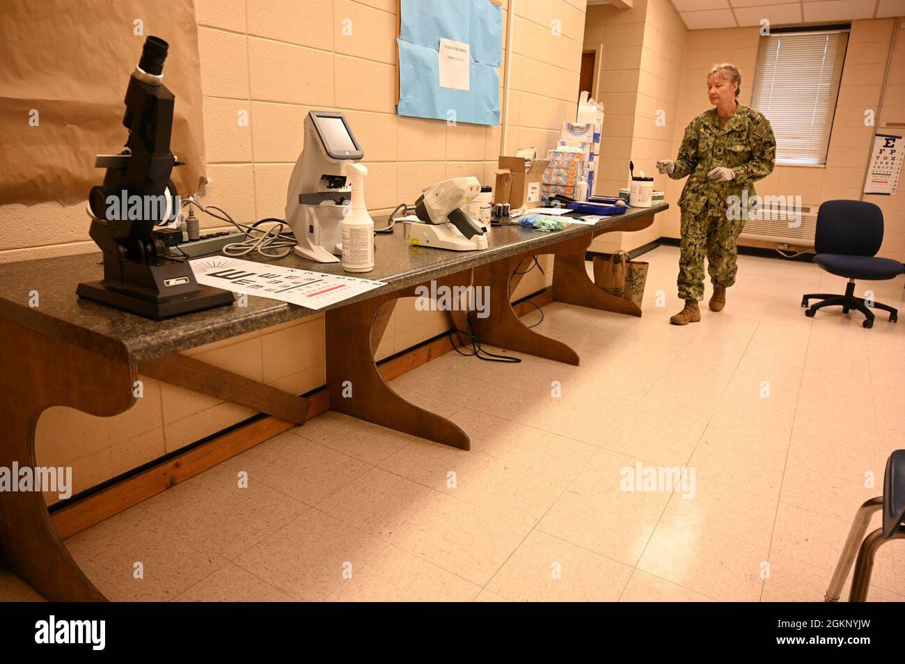 U.S. Navy Lt. Cmdr. Lisa prepares the optometry section at the