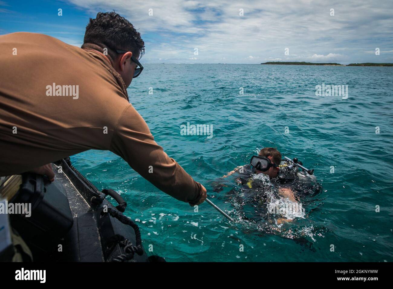 Jacob Rivers Navy U.S. Navy Chief Jacob Scarlett, left, team lead for the Maritime ...