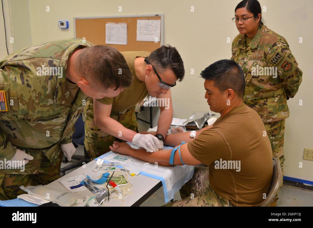 sgt-joshua-morrison-combat-medic-and-instructor-at-the-medical-simulation-training-center-on-fort-hood-helps-medics-conduct-blood-transfusion-training-during-the-joint-emergency-medical-exercise-on-fort-hood-8-11