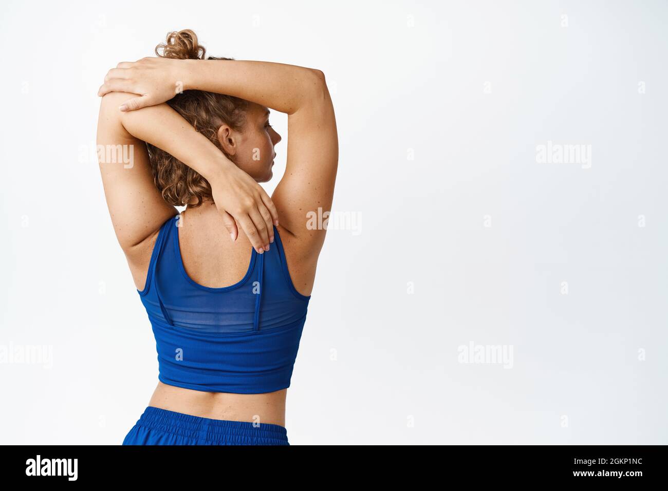 Woman stretching arms behind back hi-res stock photography and images -  Alamy