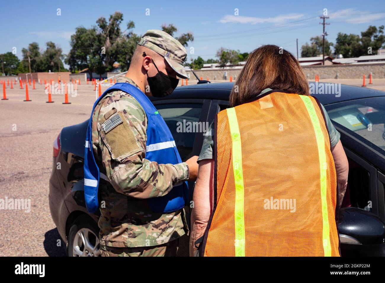 U S Army Spc James Holmes A Combat Medic Assigned To 2nd Stryker Brigade Combat Team 4th Infantry Division From Fort Carson Colorado And Civilian Registered Nurse Marilyn Hatch Work Together To Check