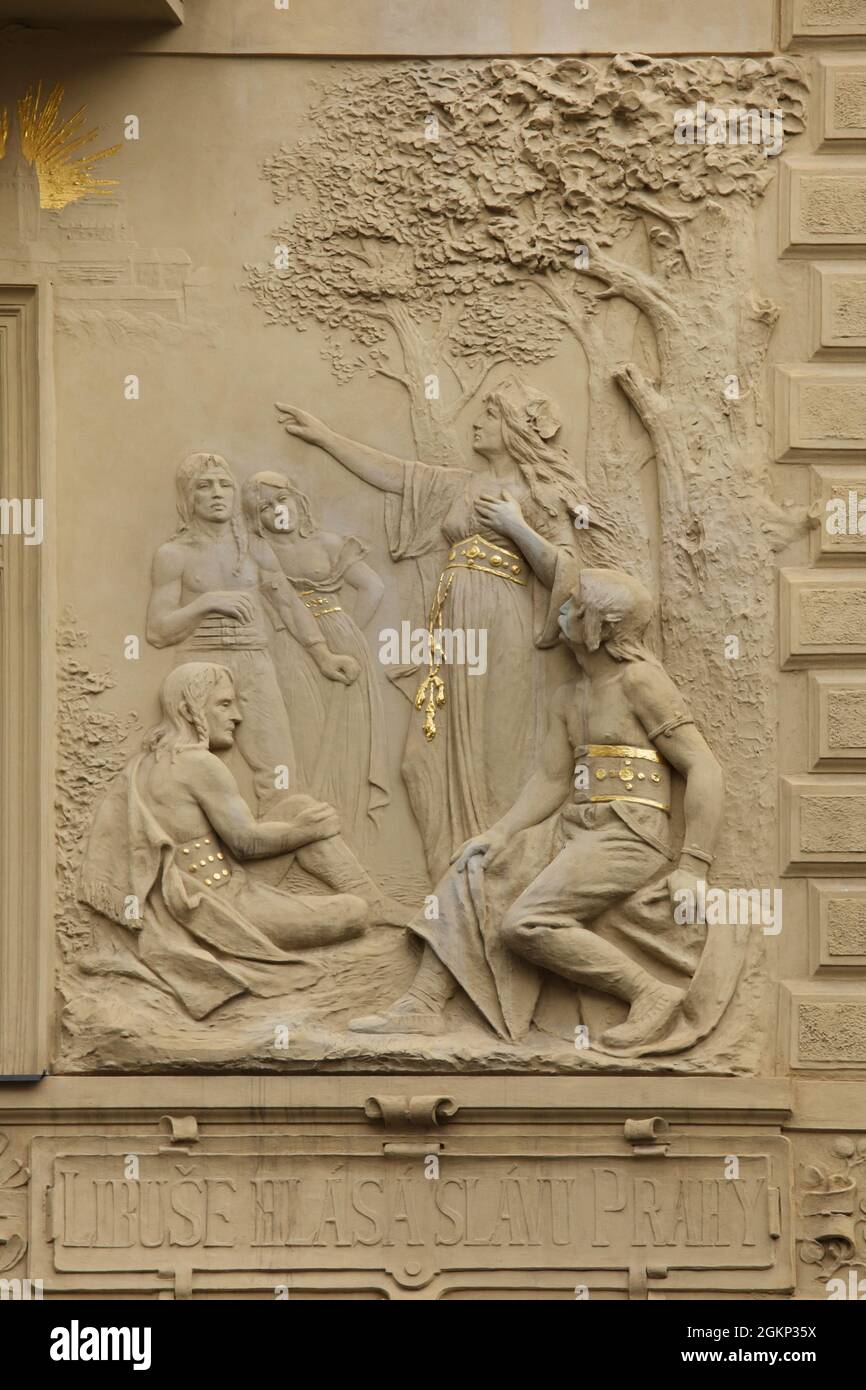Princess Libuše prophesies the glory of Prague depicted in the stucco relief designed by Czech sculptor Jindřich Říha between 1898 and 1904 on the House at Goliath (Dům u Goliáše) in Železná Street in Staré Město (Old Town) in Prague, Czech Republic. Stock Photo