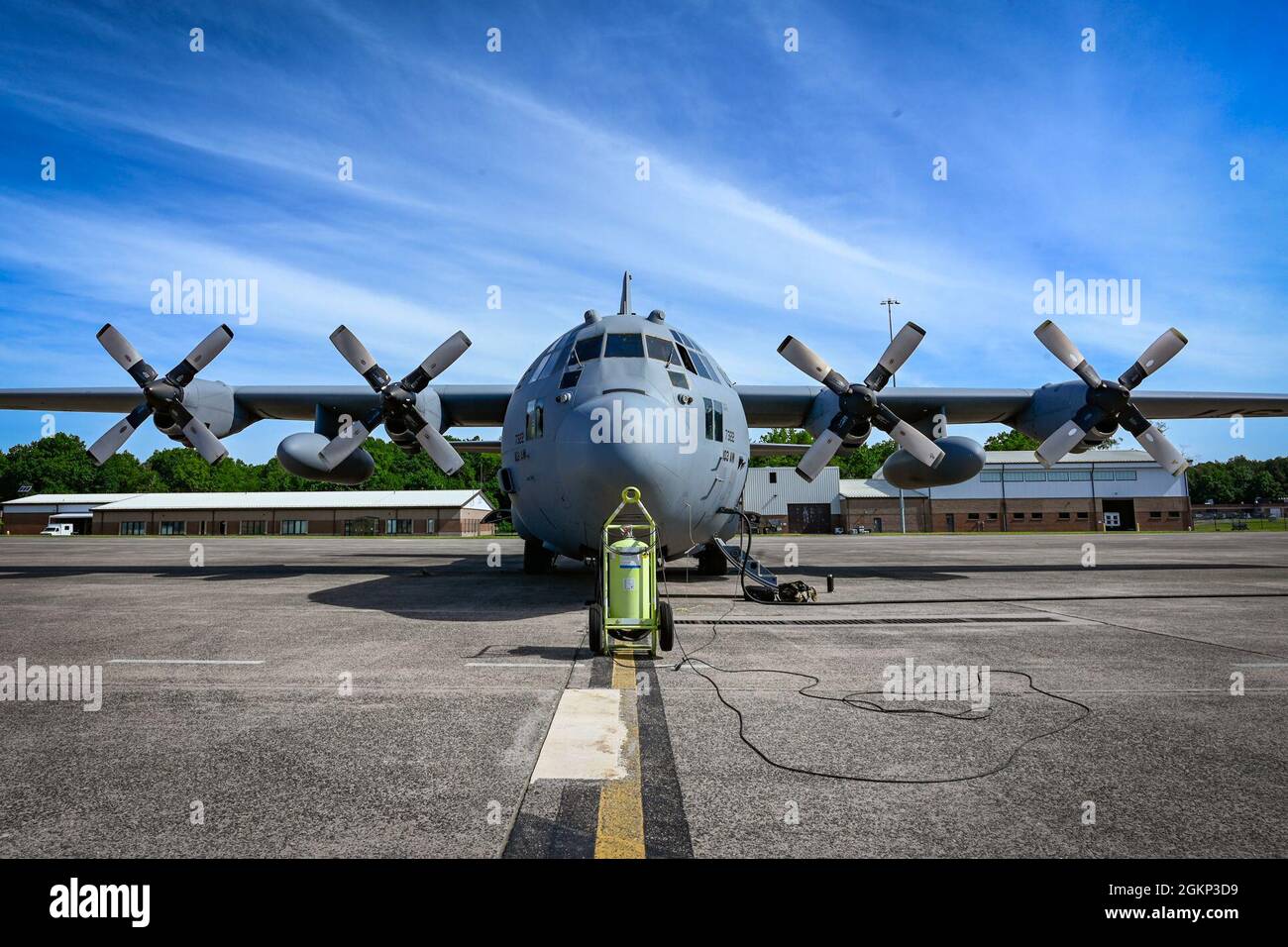 A C130H3 Hercules assigned to the 103rd Airlift Wing is parked on the
