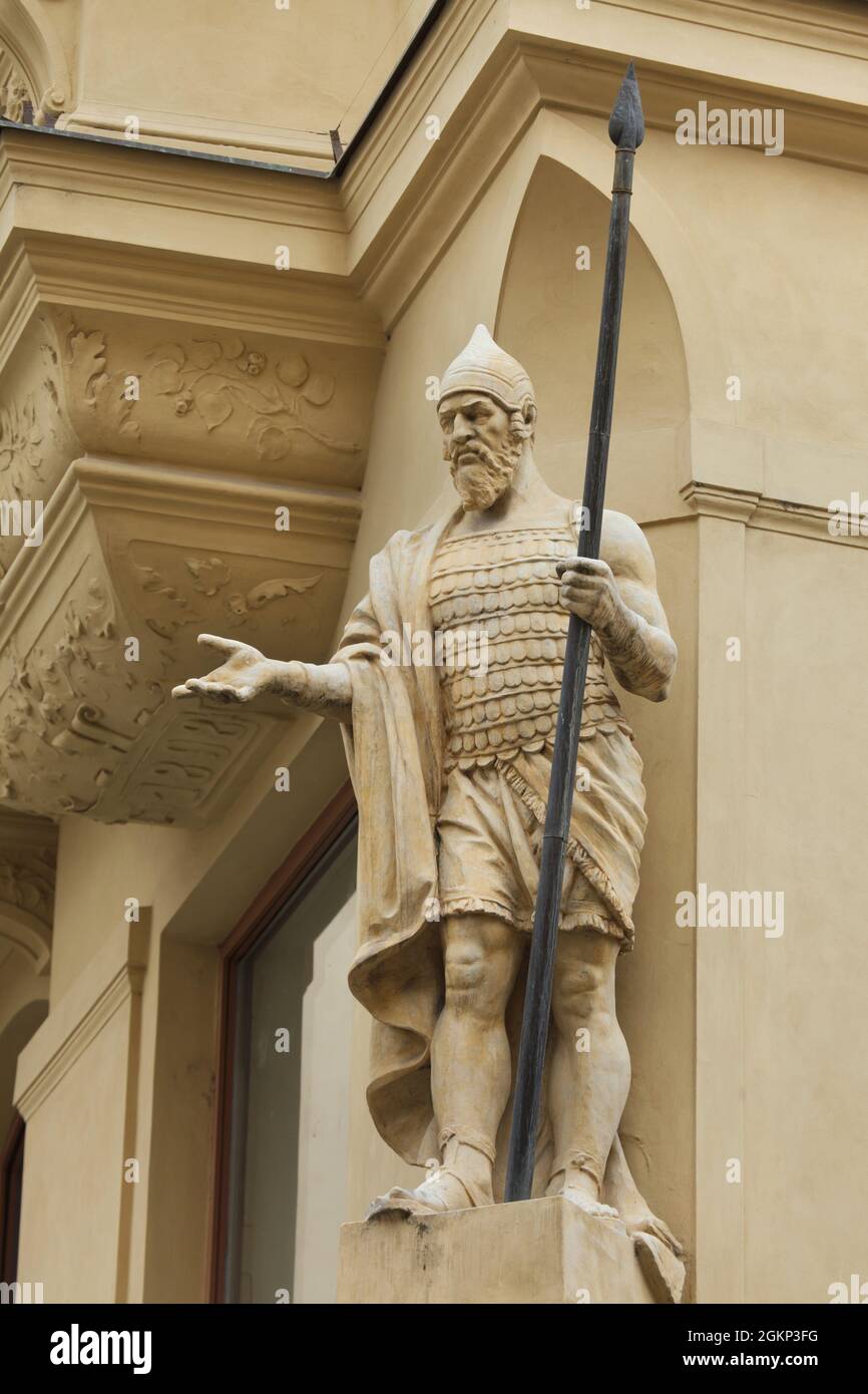 Statue of Goliath placed on the House at Goliath (Dům u Goliáše) in Železná Street in Staré Město (Old Town) in Prague, Czech Republic. The statue was designed by Czech sculptor Jindřich Říha between 1898 and 1904. Stock Photo